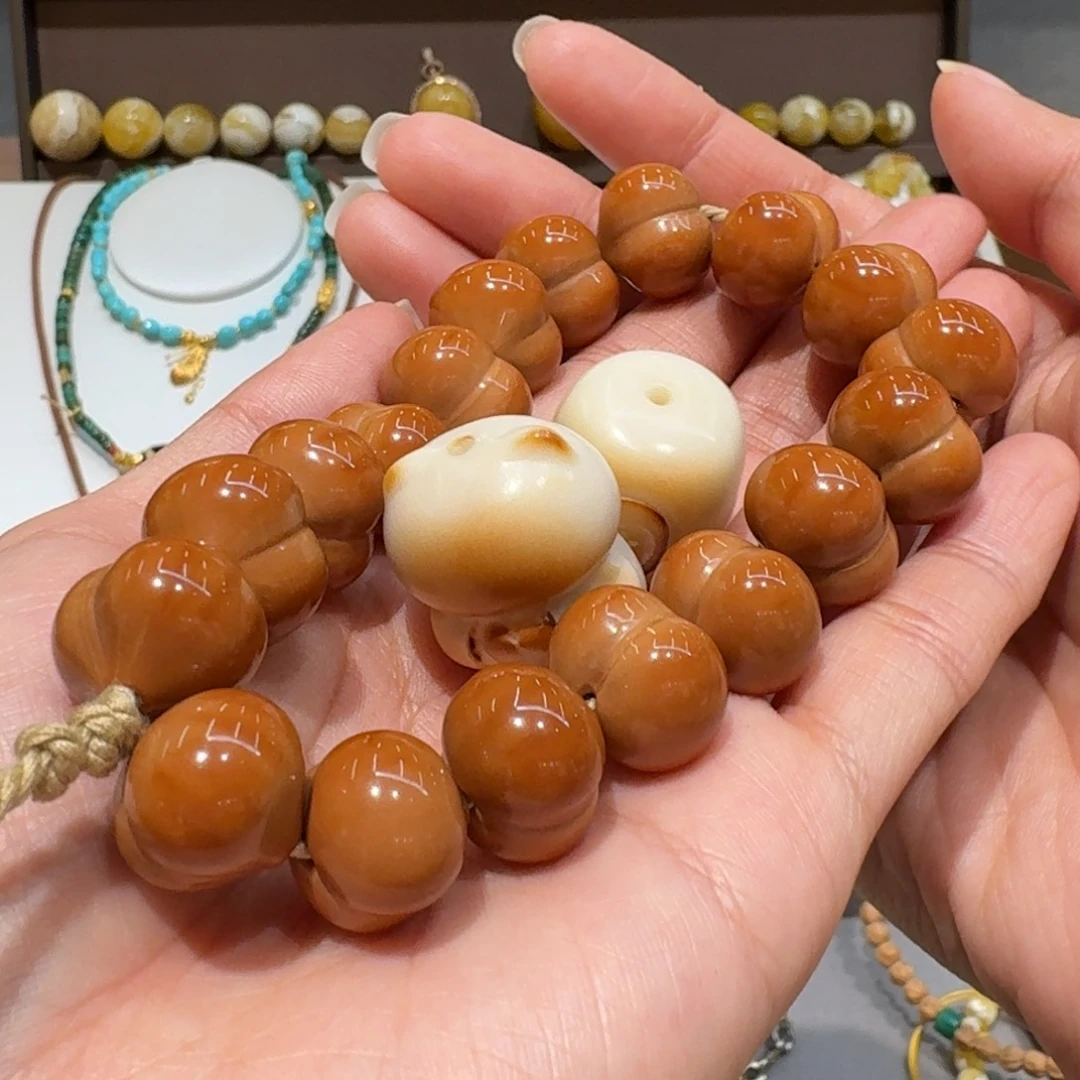 晓***猴头核桃手串猴头屁桃手持