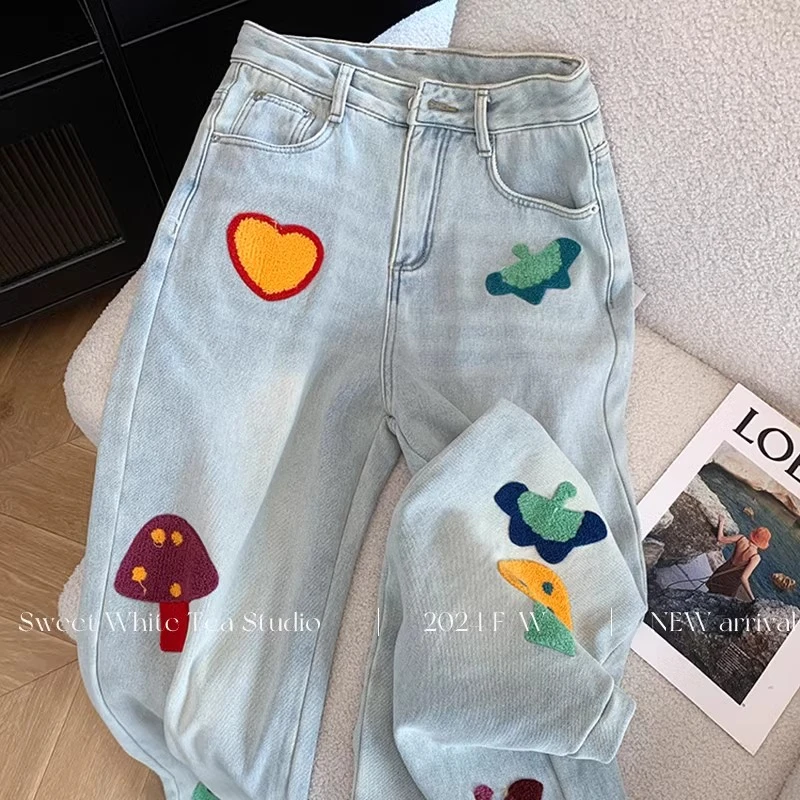 浅蓝色卡通刺绣阔腿牛仔裤女2025年春季新款高腰显瘦直筒拖地裤子