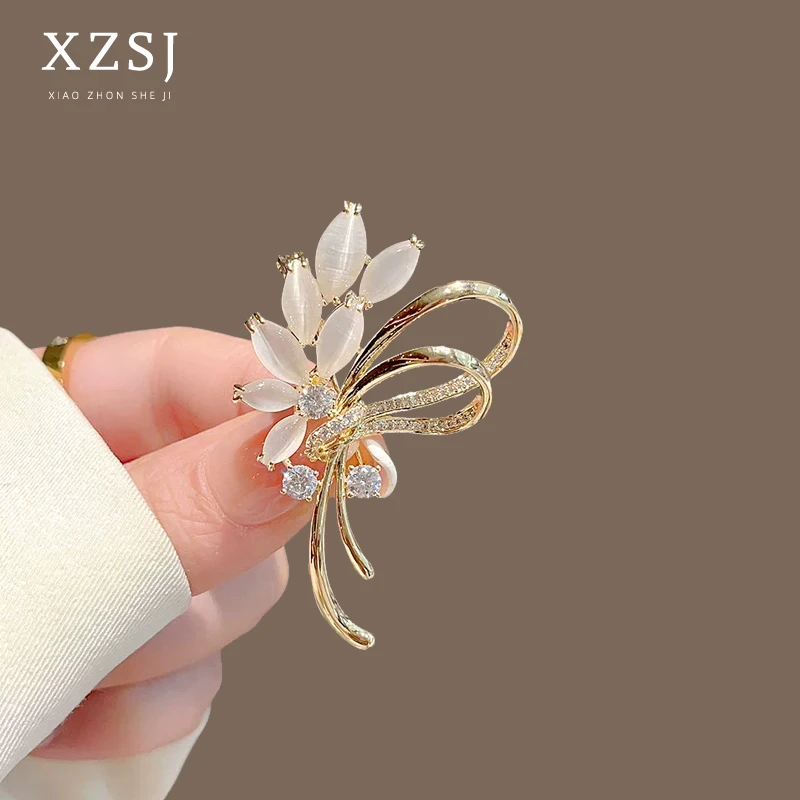 铜锆石胸针 新款优雅花束猫眼石别针女西装大衣胸花防走光扣配饰