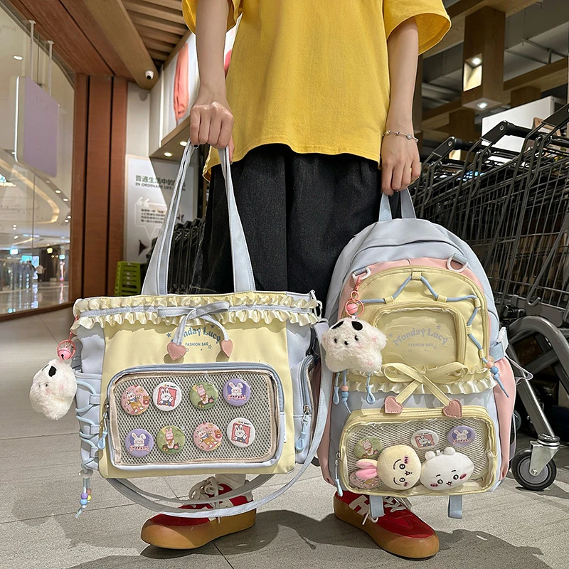 二次元日系吧唧痛包大容量单肩娃包初中生书包可爱学生双肩背包潮
