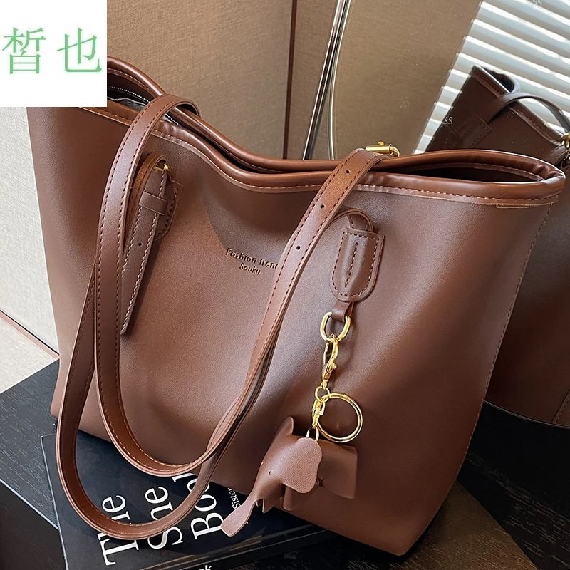 大容量包包女2025新款高级感大学生上课单肩包女士手提通勤托特包