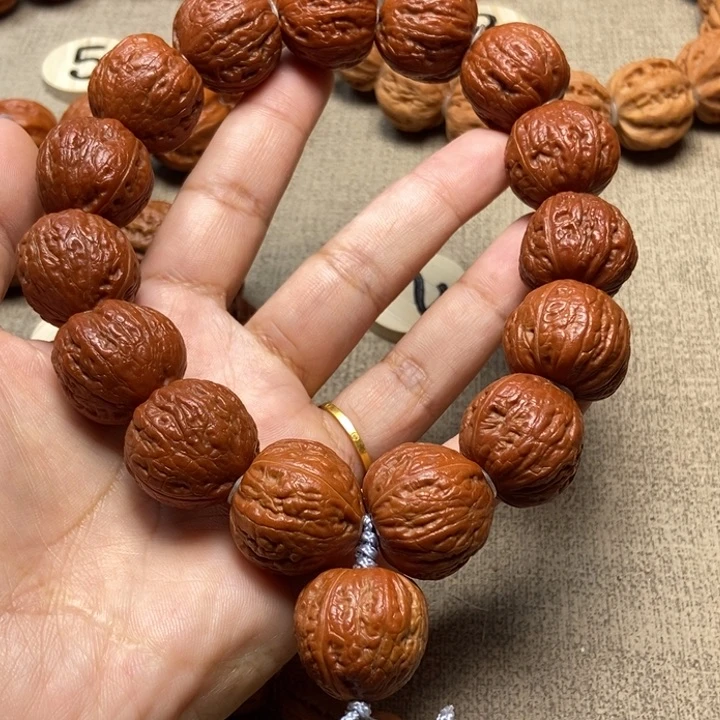 文玩核桃吊坠a****7红皮火柿子