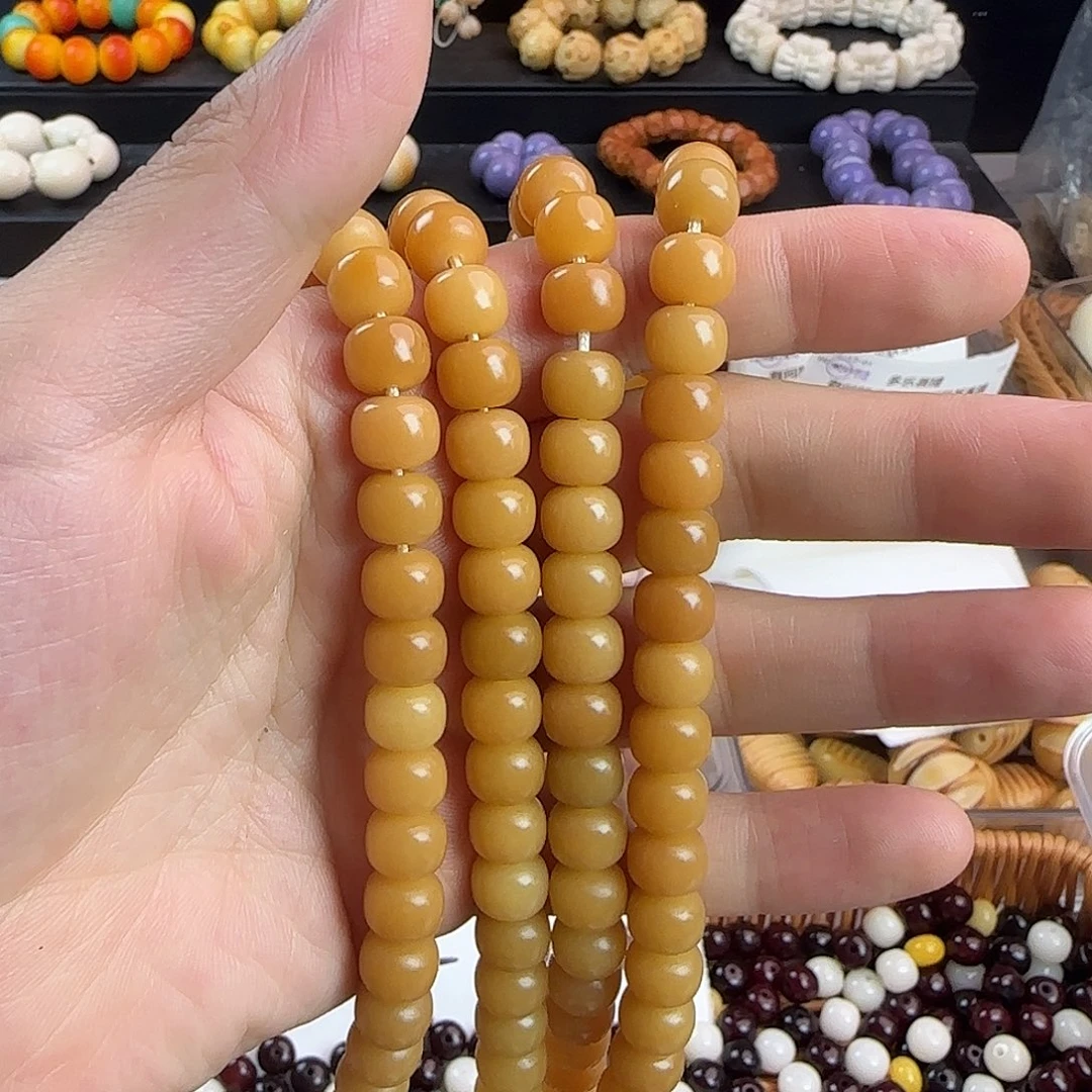 菩提根/象牙果手串卡10黄桶一条（114颗）