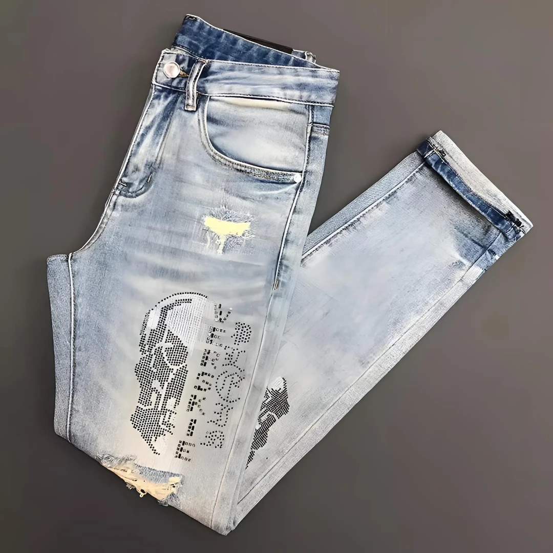 GS欧货2025春季新款牛仔裤男士潮牌骷髅头烫钻破洞浅色修身小脚裤