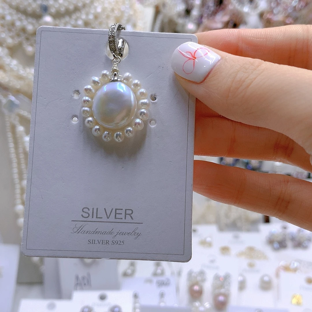 银S925镶嵌耳饰淡水珍珠晓****！