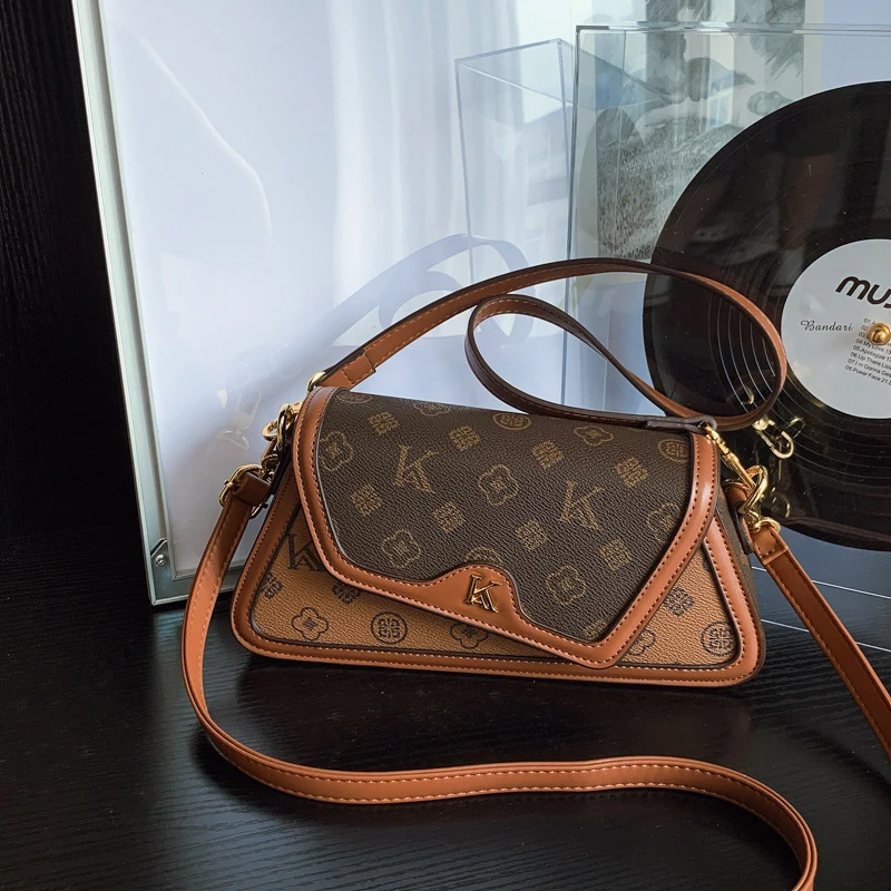 %025秋季新款单肩包斜挎包印花老花包撞色三角包时尚大容量包多隔