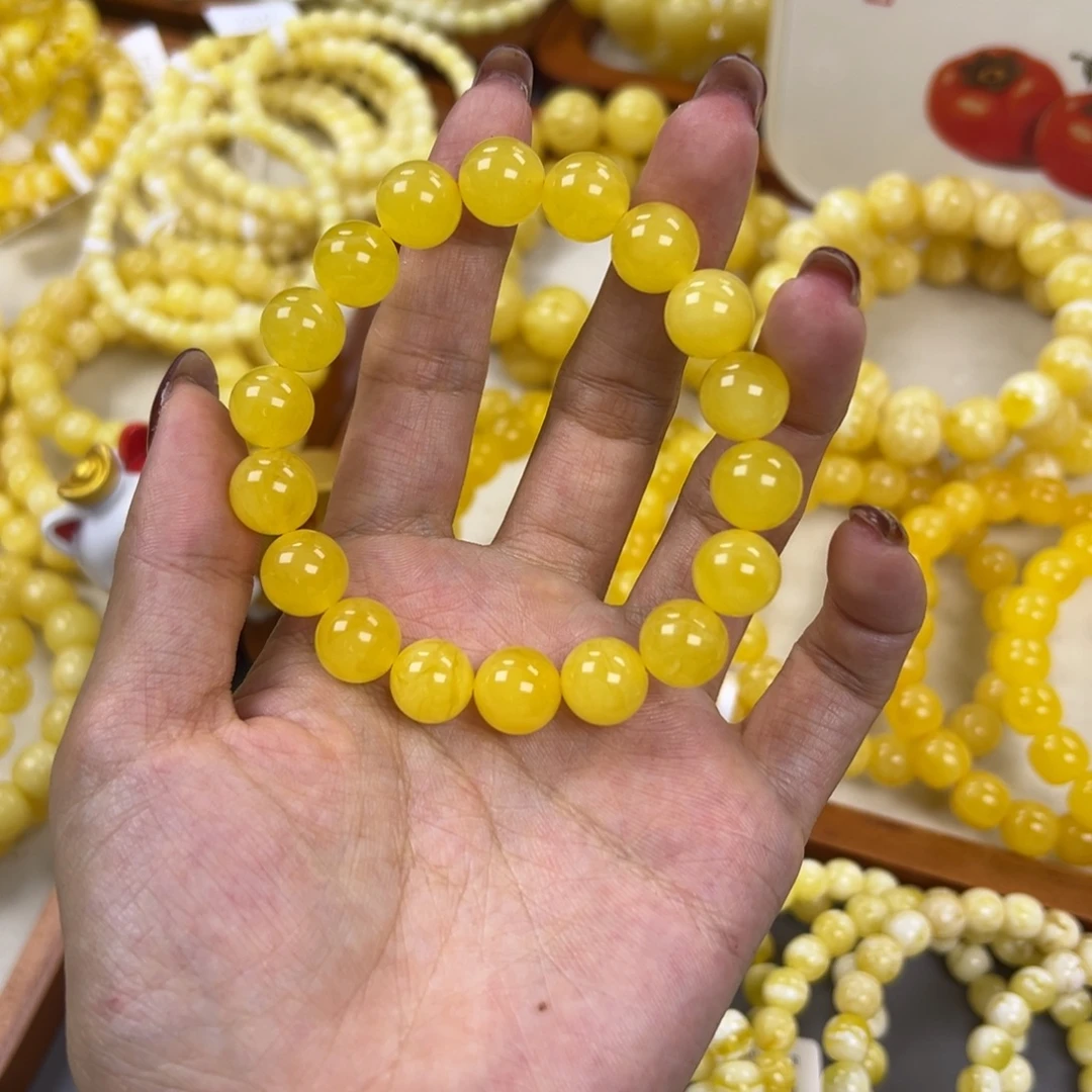 琥珀未镶嵌手链11+圆珠鸡油黄