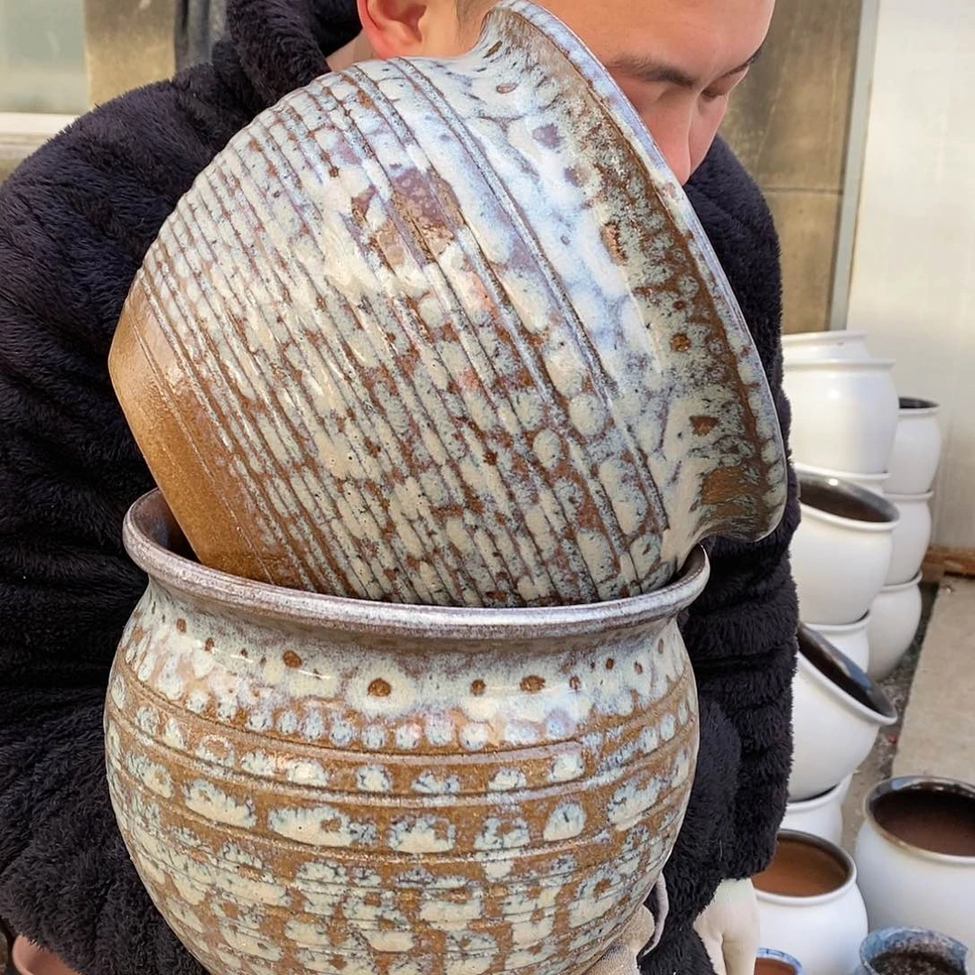 紫砂花盆口20高16暇疵