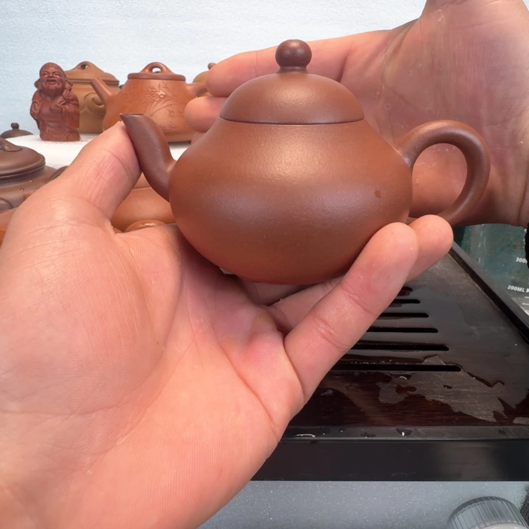 喝****桃宜兴紫砂壶全手工制作