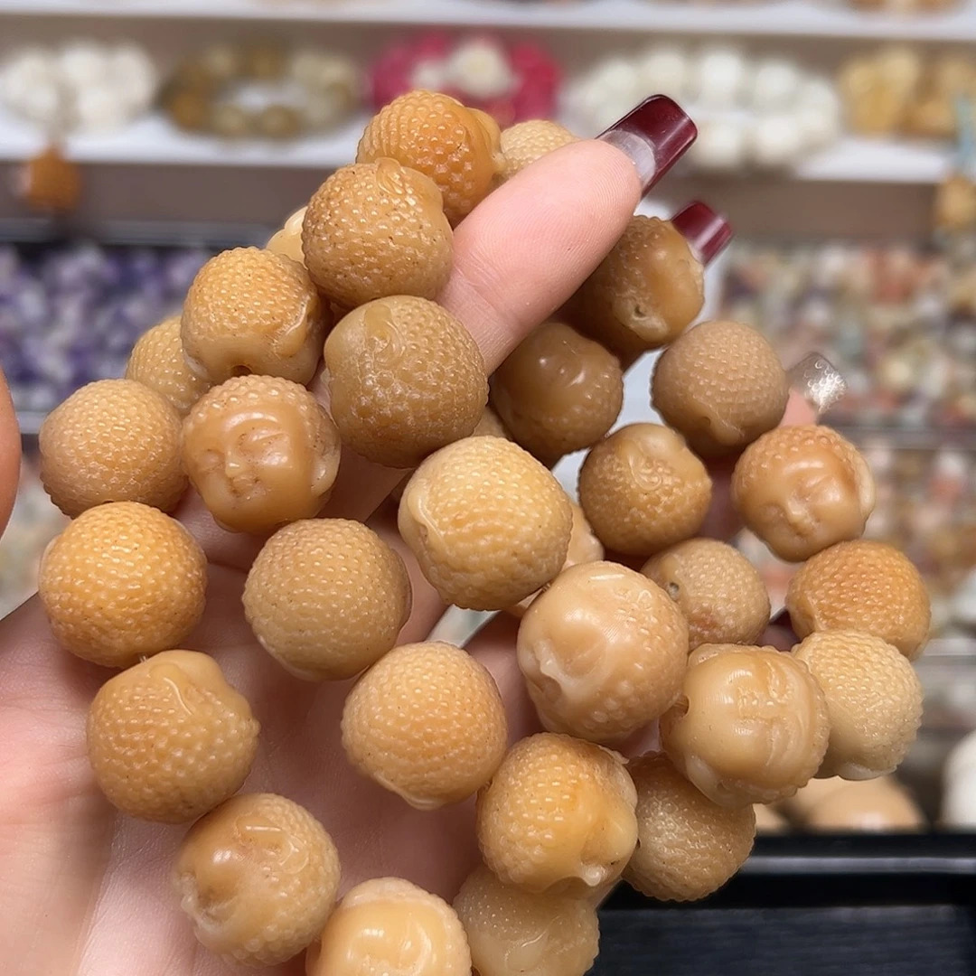 手串菩提根/象牙果瑕疵佛头1条有裂
