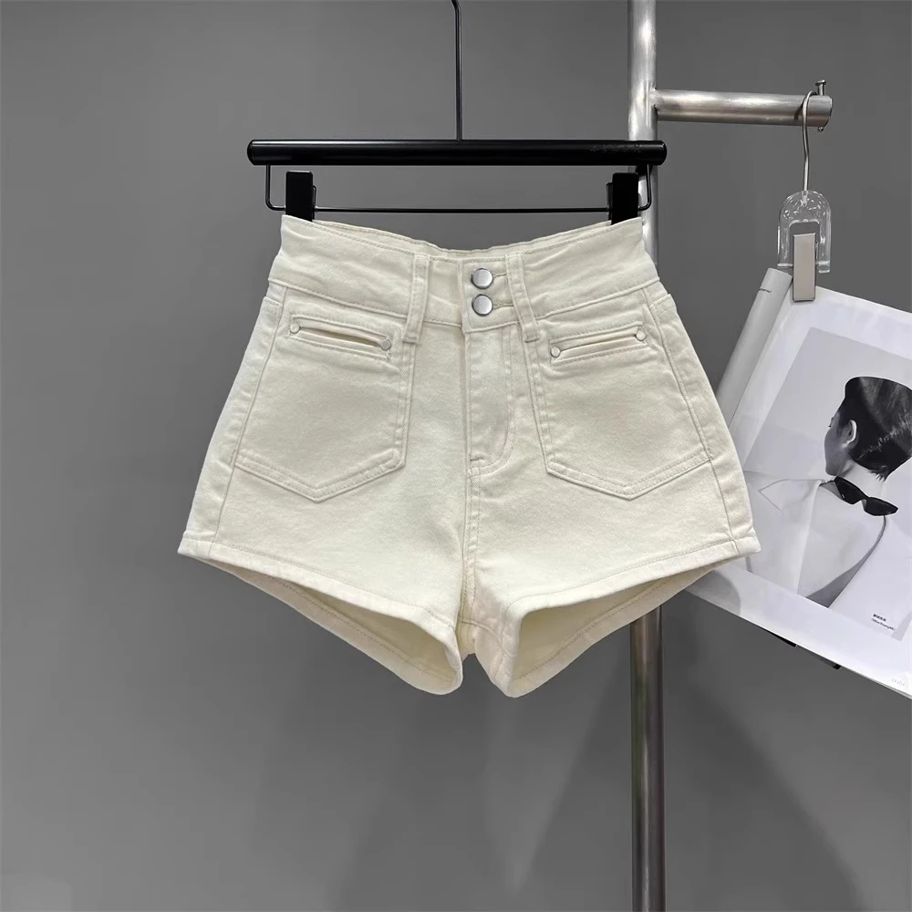 双扣口袋设计夏季新款小众辣妹洗水做旧修身显瘦牛仔短裤高腰弹力