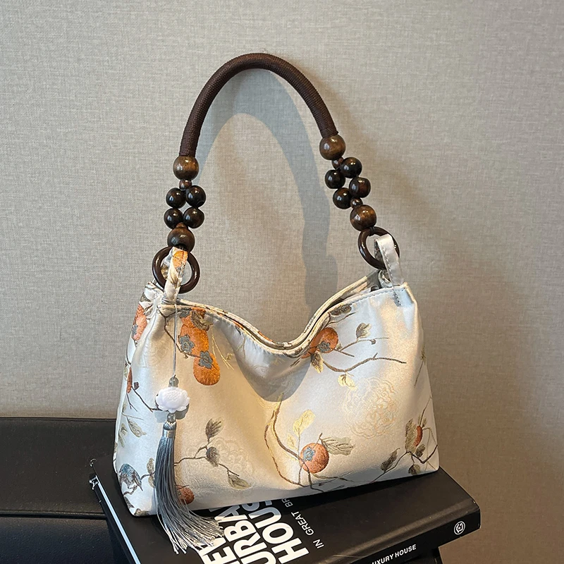 小众国风刺绣包包女2025新款夏季百搭单肩腋下包新中式手提托特包