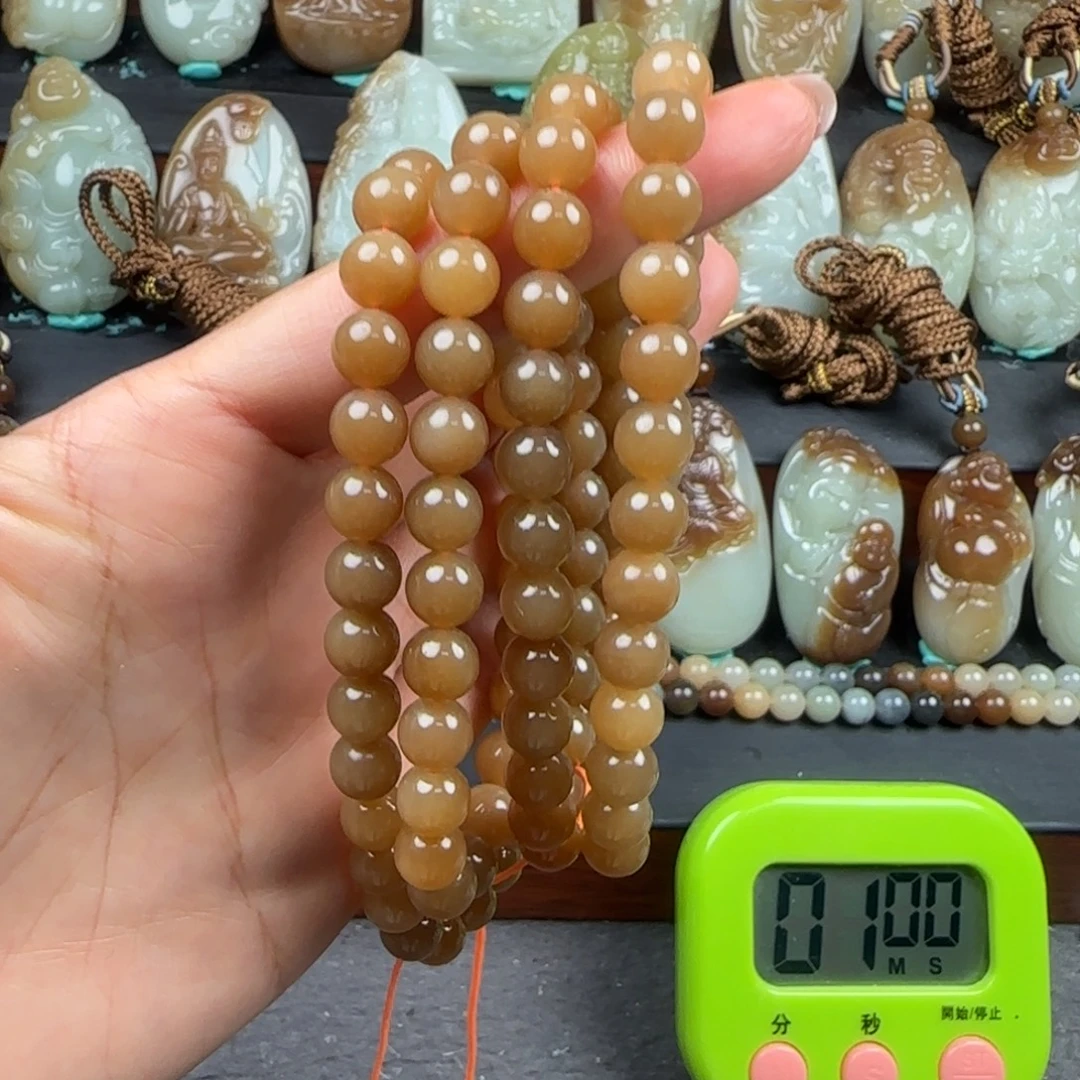 喵***西未镶嵌和田玉挂件