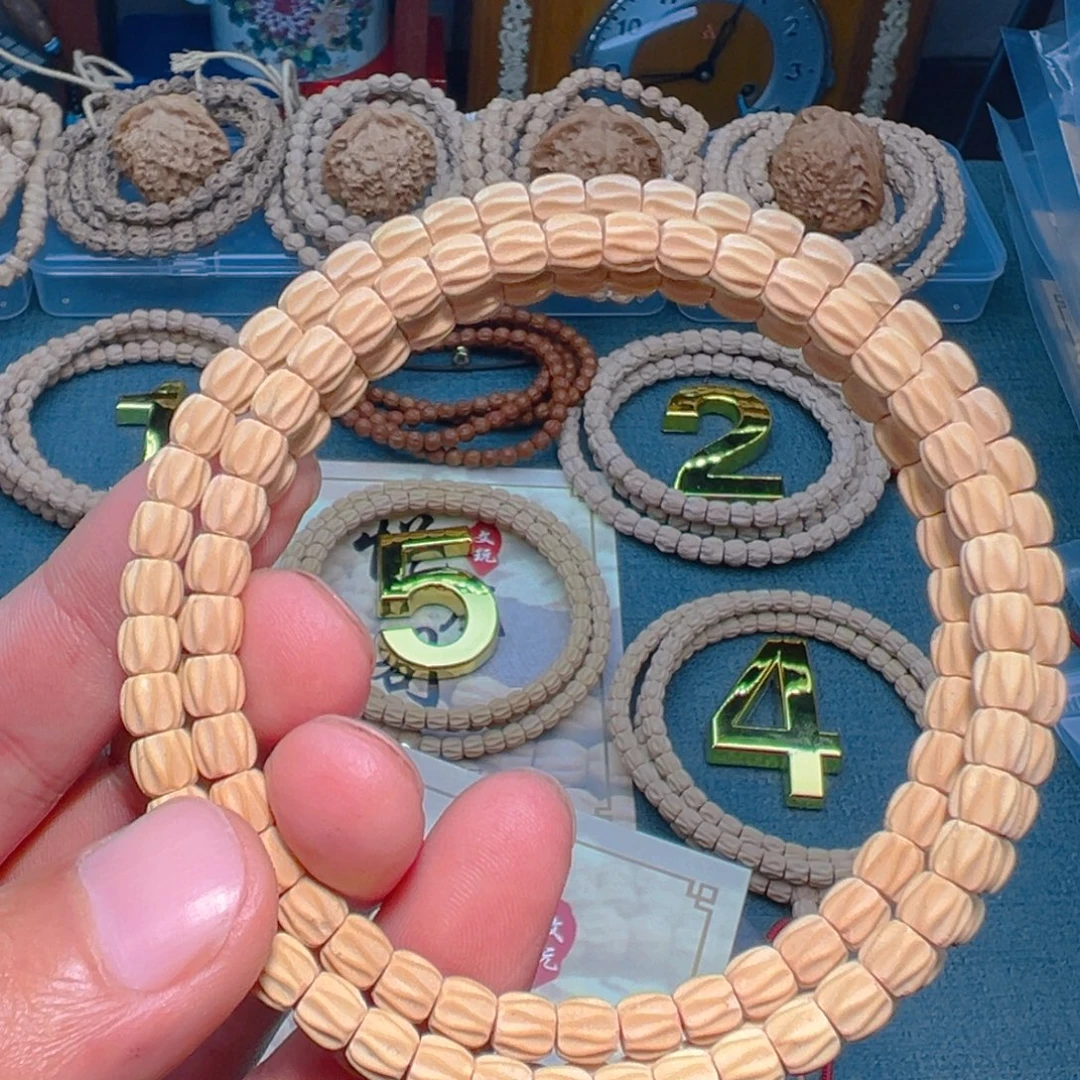 弓***张吊坠柏香籽/百香籽