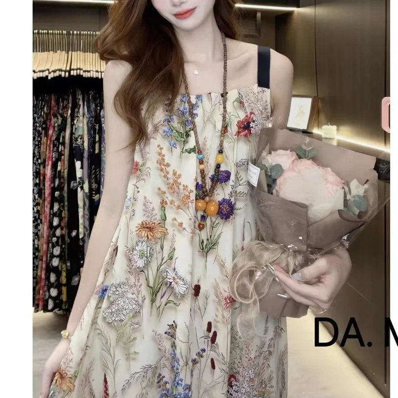 2025新款夏季显瘦时尚轻奢宽松遮肉沙滩裙长碎花吊带连衣裙气质