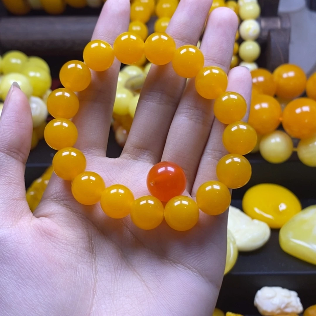 橘***糖非金属树脂老蜜手串加蜜糖红珠子