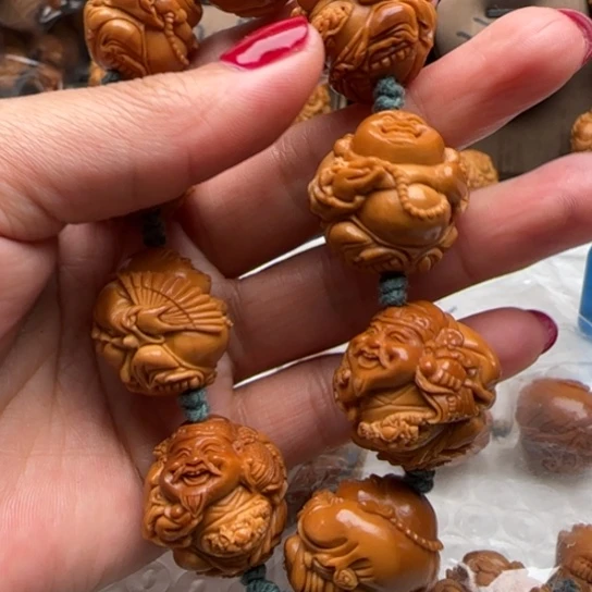 小***头手串橄榄核橄榄雕刻工艺品