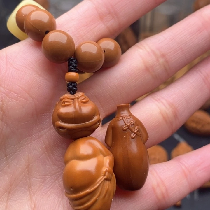 万***法橄榄核吊坠手盘一套