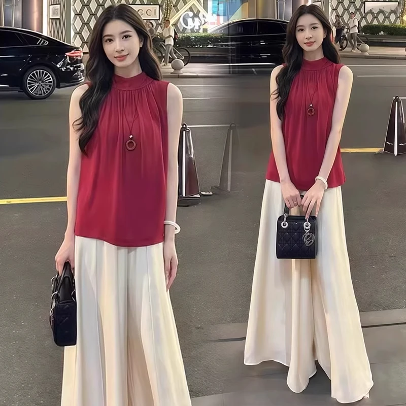 时尚套装女2025夏季新款显瘦设计感无袖挂脖上衣阔腿裙裤两件套潮
