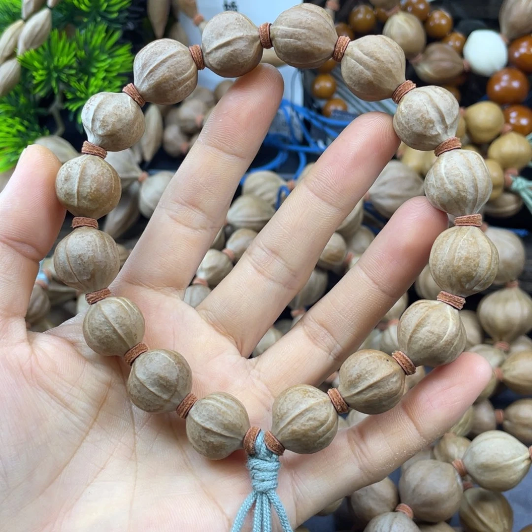 风***行吊坠橄榄核蜜桃鲨鱼背