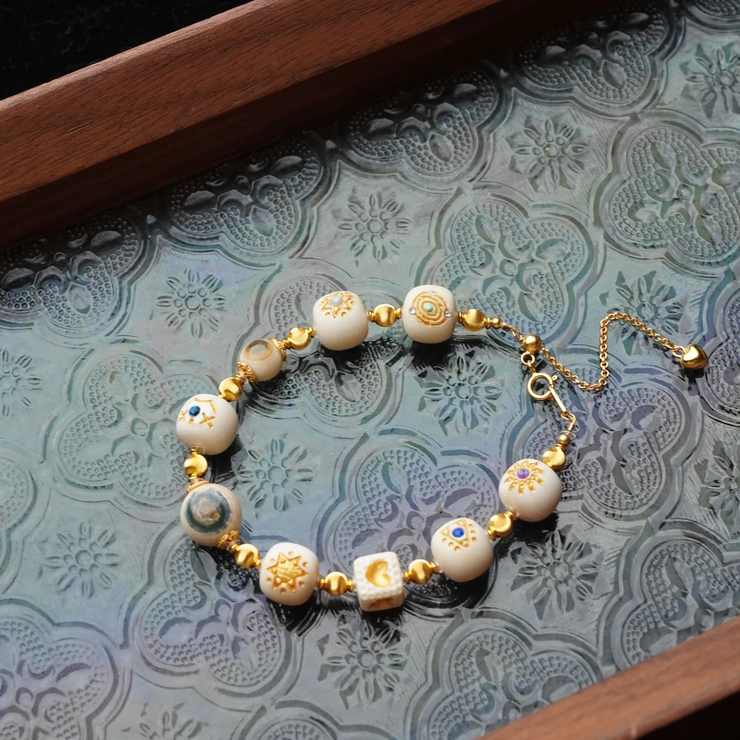 时间旅行者 天然猛犸牙9*10mm雕刻单圈蓝眼手串