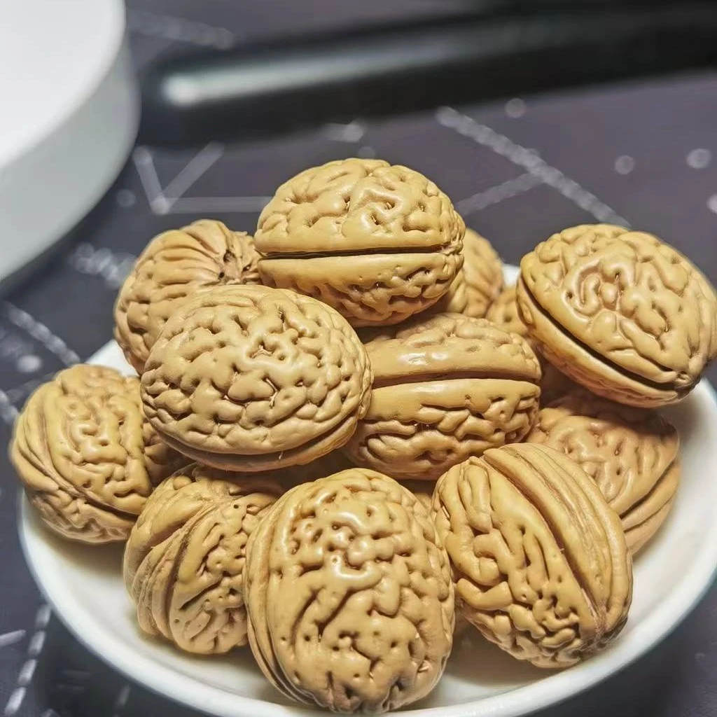 盘锦爆肉钱袋子桃核