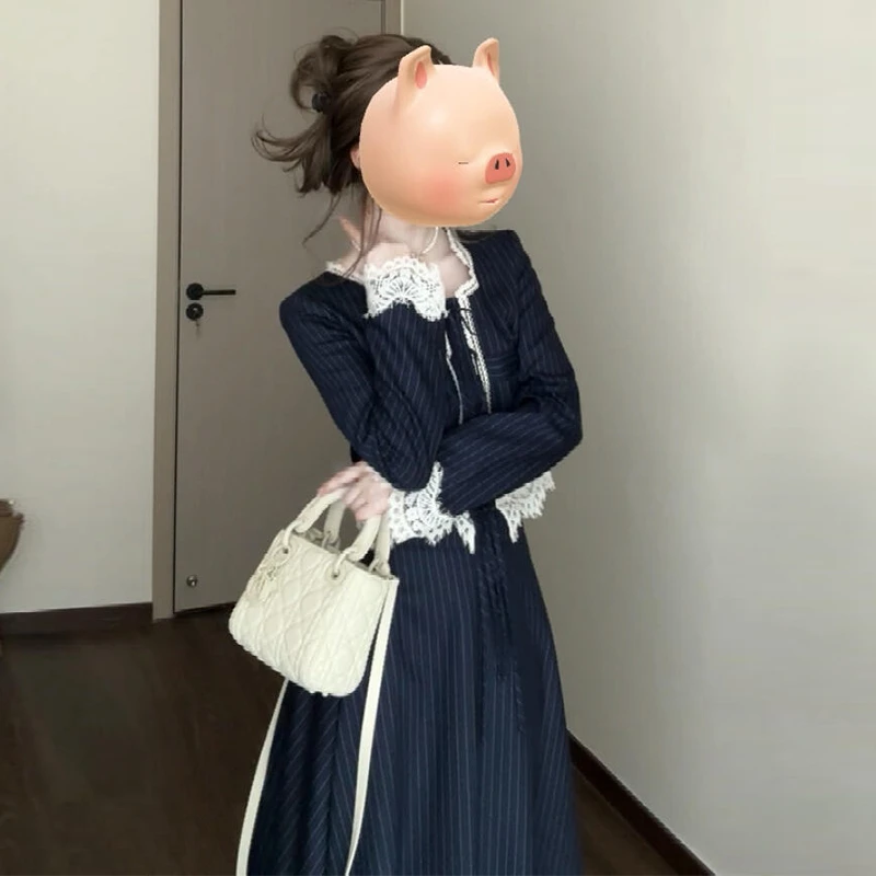 早秋简单大方高级感穿搭2025新款独特气质半身黑色掐腰收小黑裙子