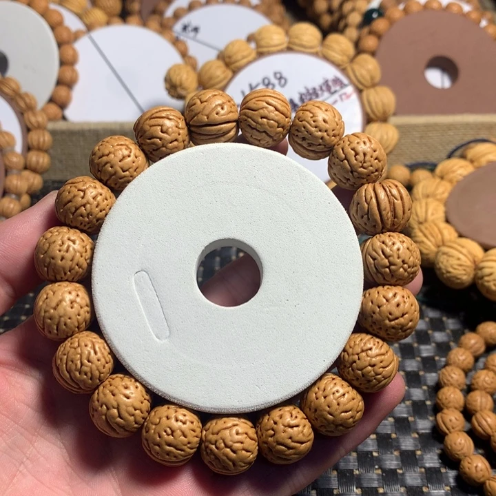 左***桃核手串15#红皮金丹