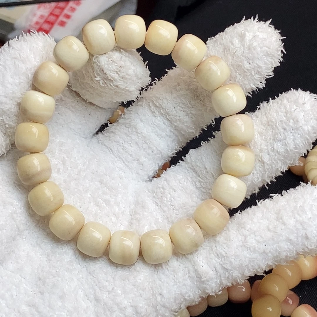 鱿***雨驼骨手串/手链手串11