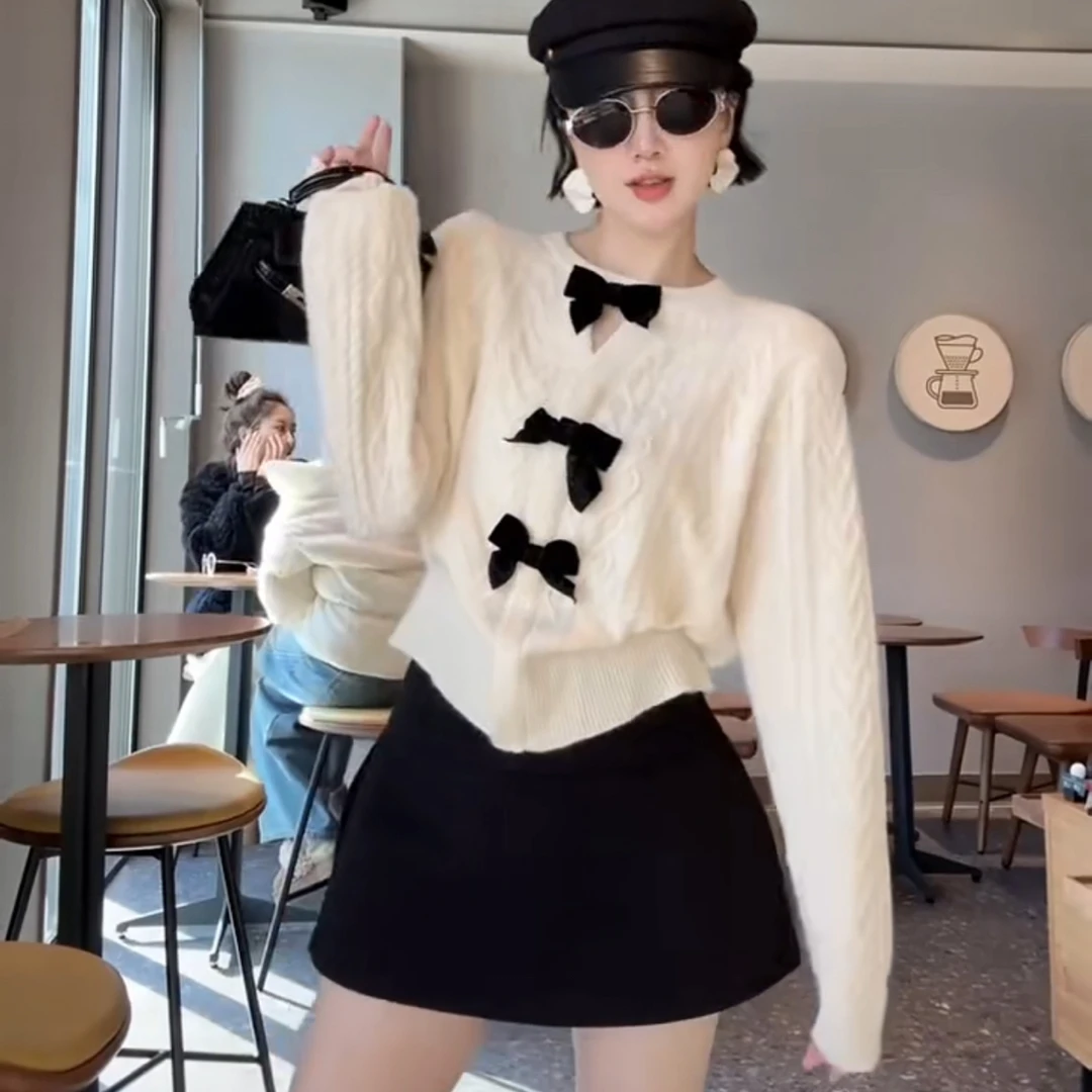 9073甜美蝴蝶结软糯针织开衫毛衣
