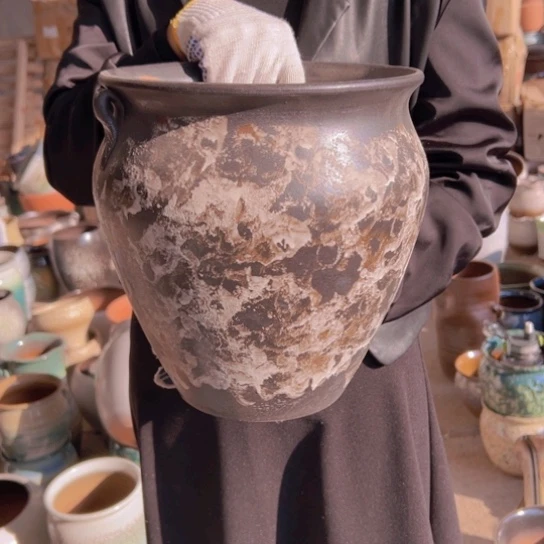 紫砂花盆高26口24。