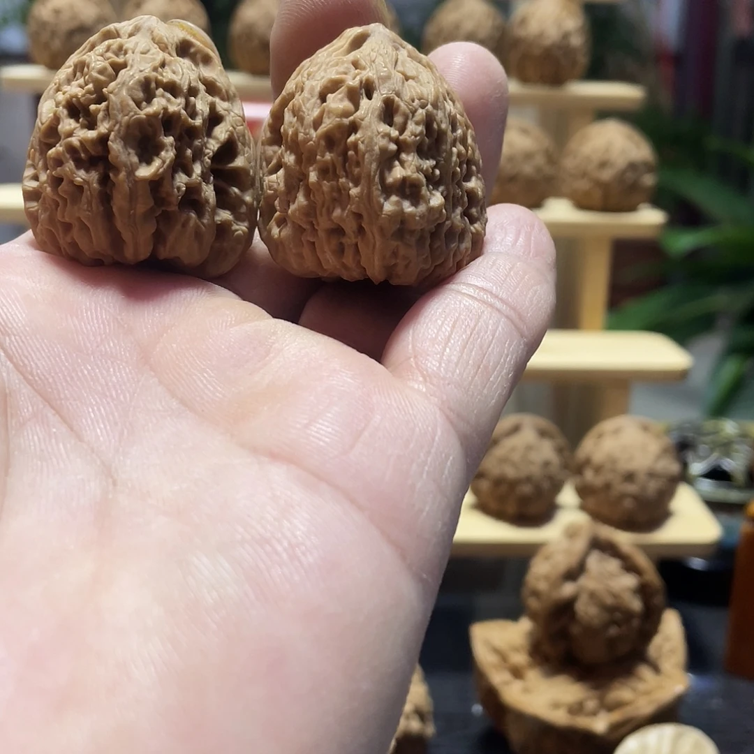 小***人桃核吊坠文玩核桃南将石