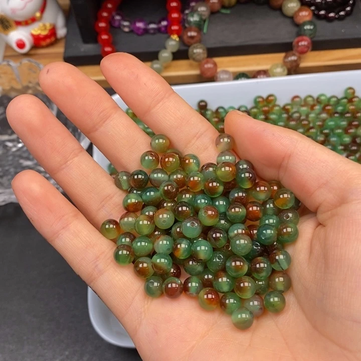 玛瑙/玉髓未镶嵌卡6孔雀玛瑙33个