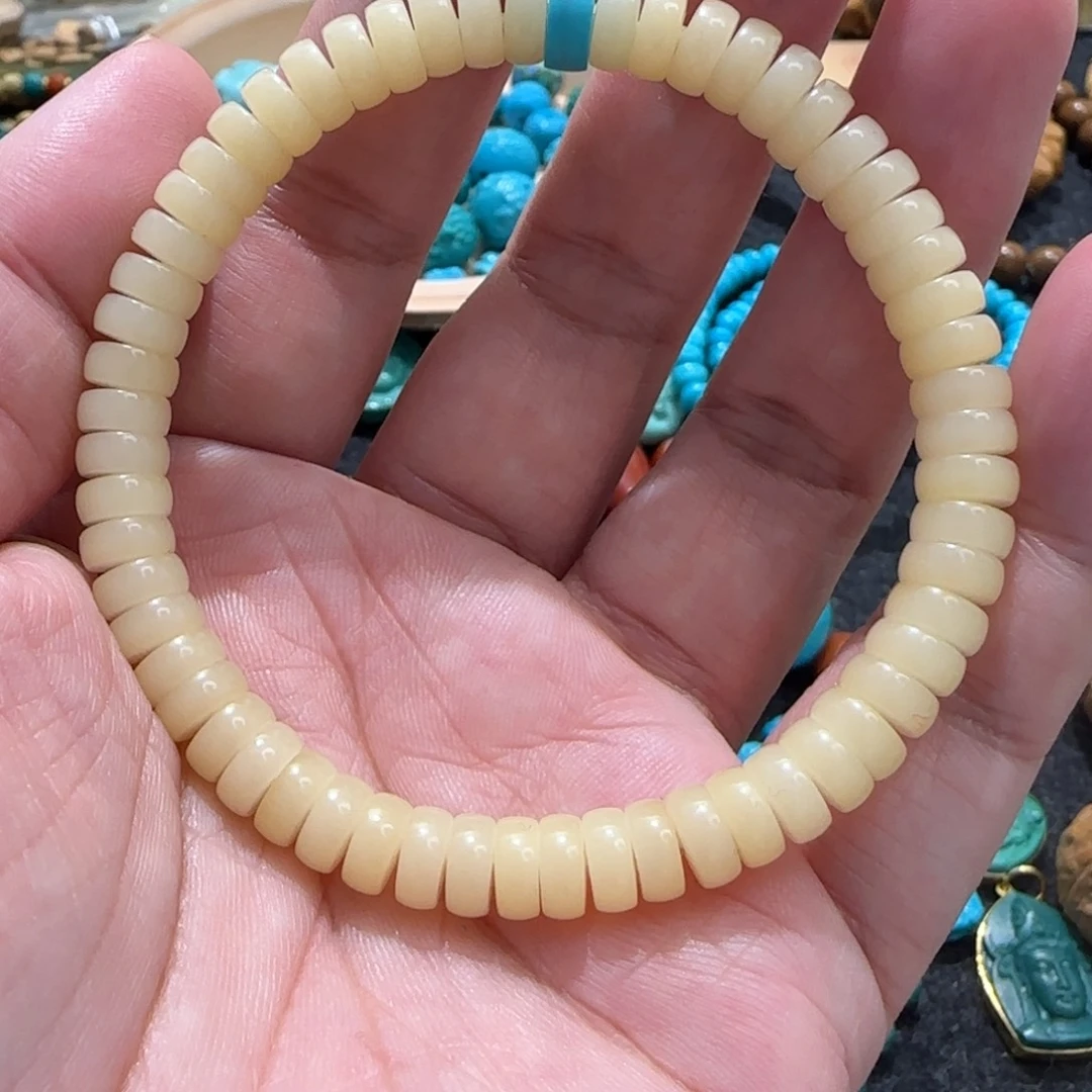 羽***涅把件菩提根/象牙果