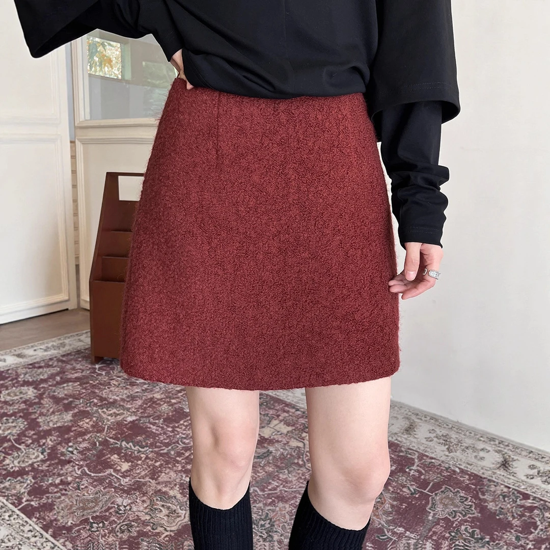 初打十三行2025冬季50羊毛简约短裙松弛毛圈呢通勤半身裙女BQA257