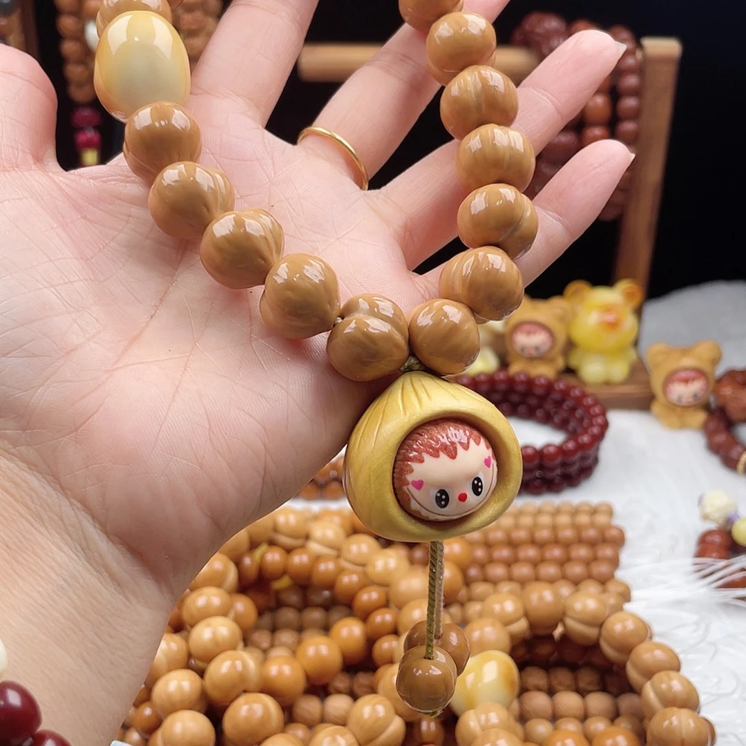 l****吊坠猴头核桃手串