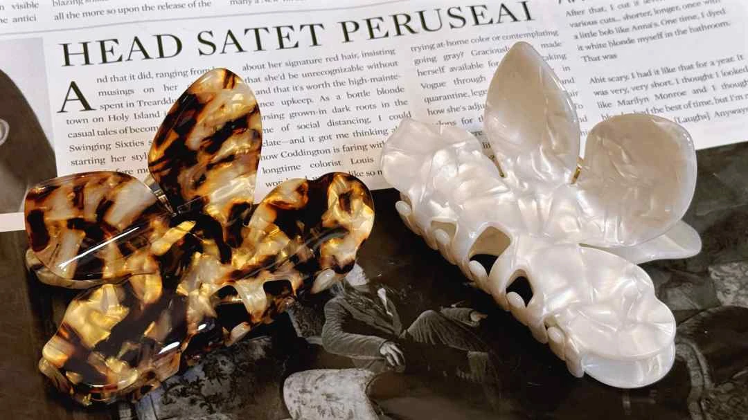 iFASHION  醋酸9cm 木棉花立体抓夹 简约度假精致 气质发夹女新款