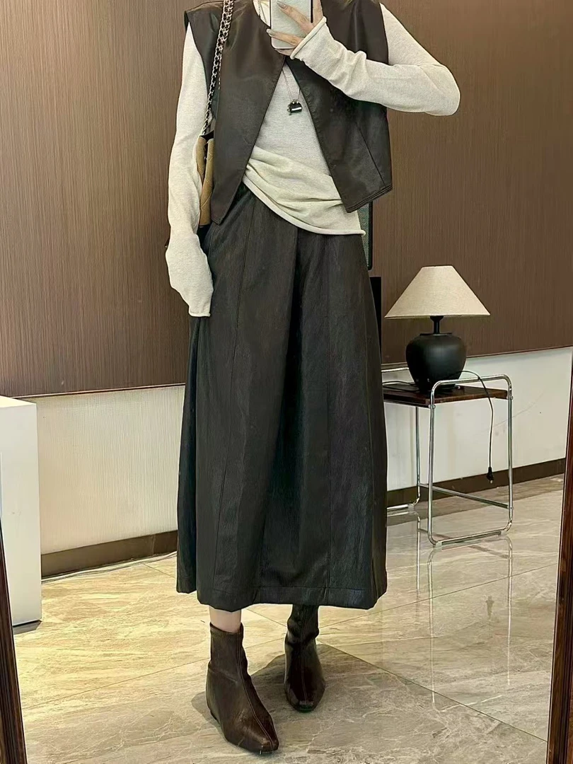 XiANJiE  2025早秋显瘦气质休闲松紧腰肌理感皮裙半身裙