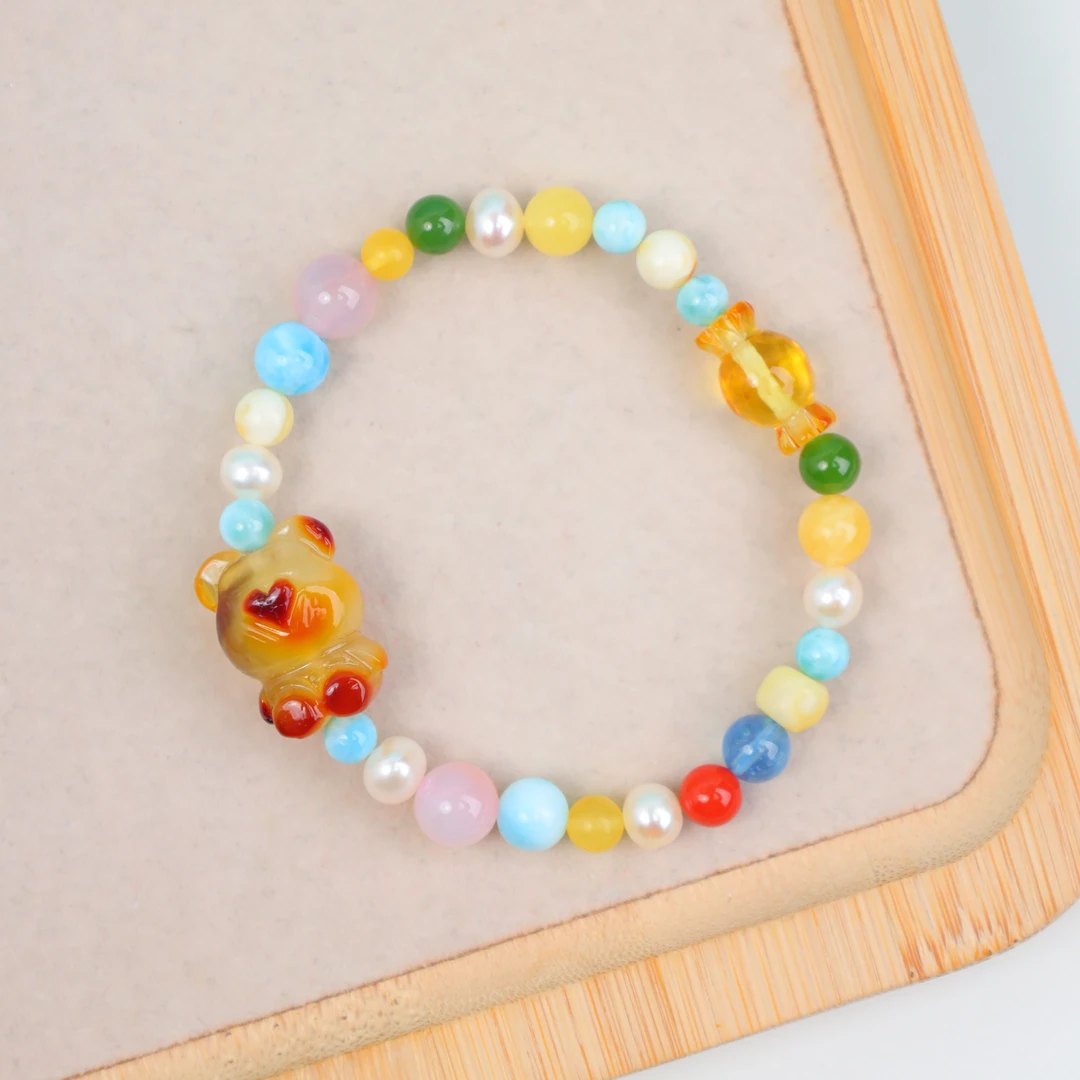 【琪琪珠宝】时尚多宝款蜜蜡小熊糖果手串