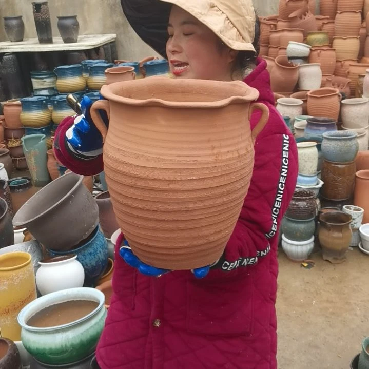 红陶口25高30瑕疵一个