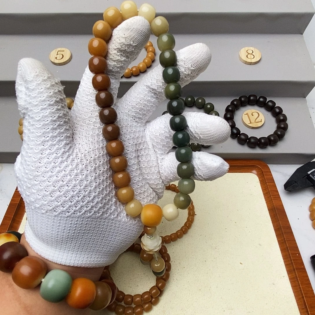 羽***绒菩提根/象牙果吊坠