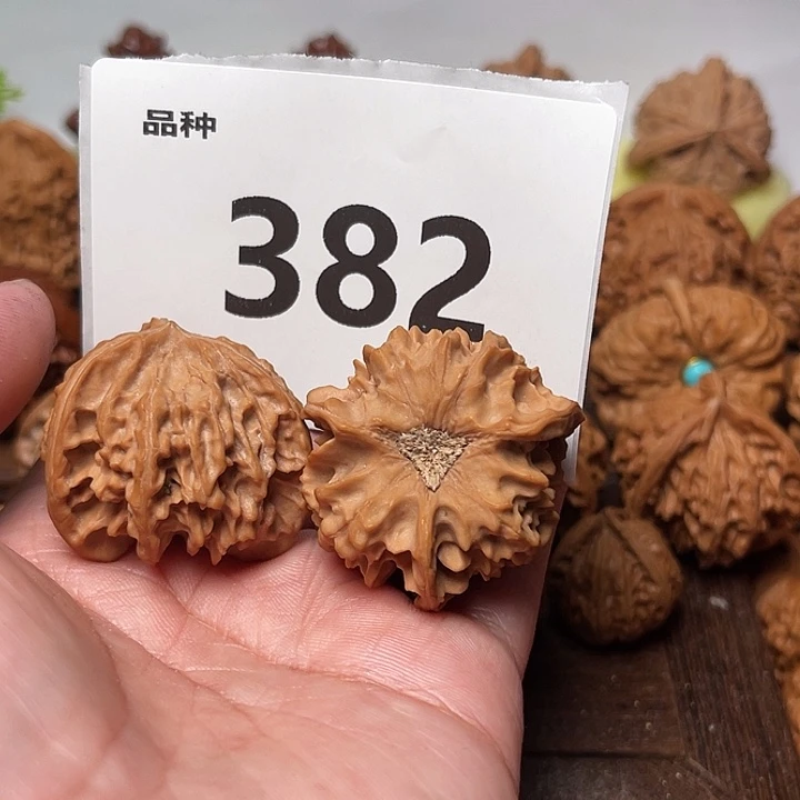 R***k桃核把件龙门涧 三棱全。边37。 382