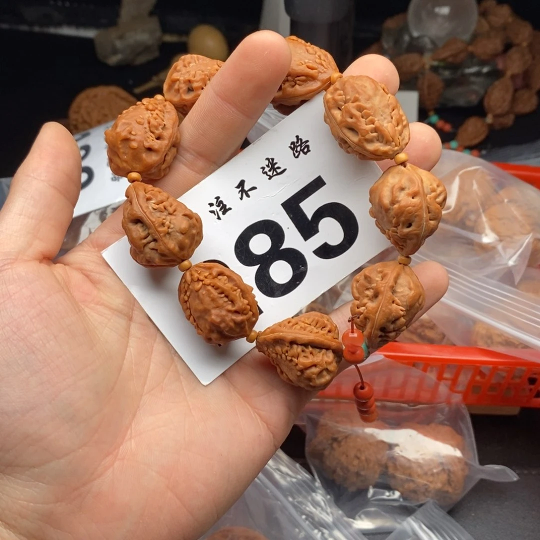 文玩核桃吊坠麒麟角