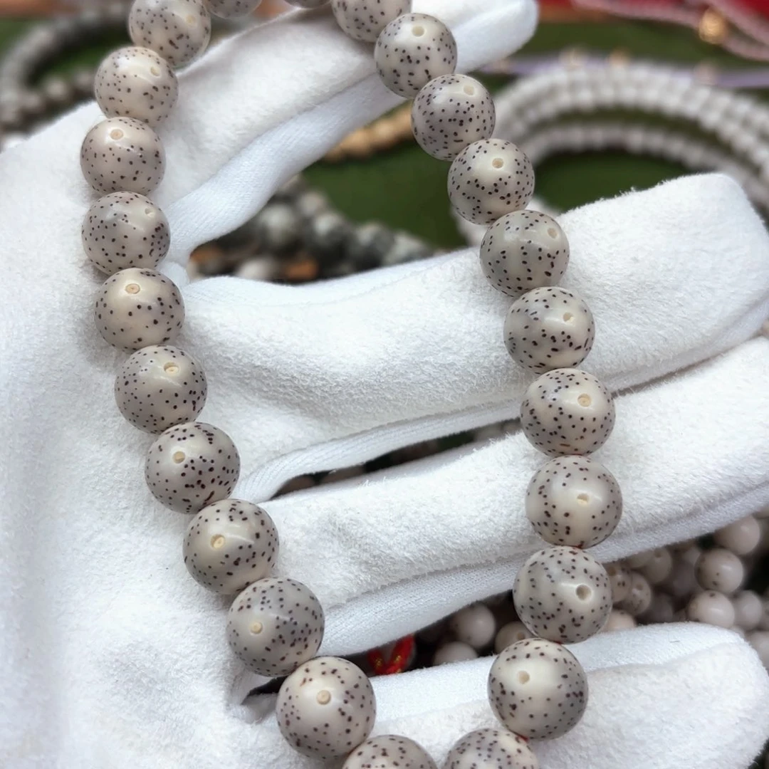 碳***物星月菩提吊坠10圆手持单金标