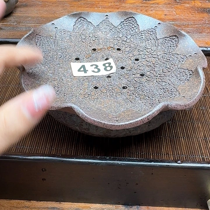 纯手工制作粗陶茶具难**涂