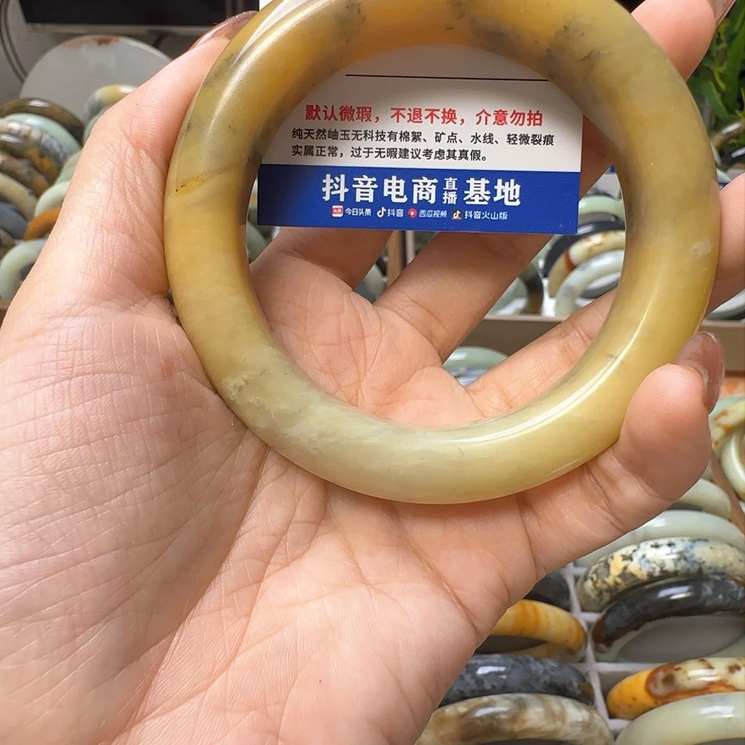 蛇纹石玉手镯合金乐**