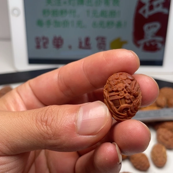 橄榄核吊坠橄榄核雕刻单子。