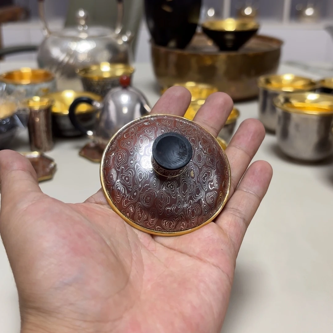 李小鹤银木纹金足金1.5克盖子