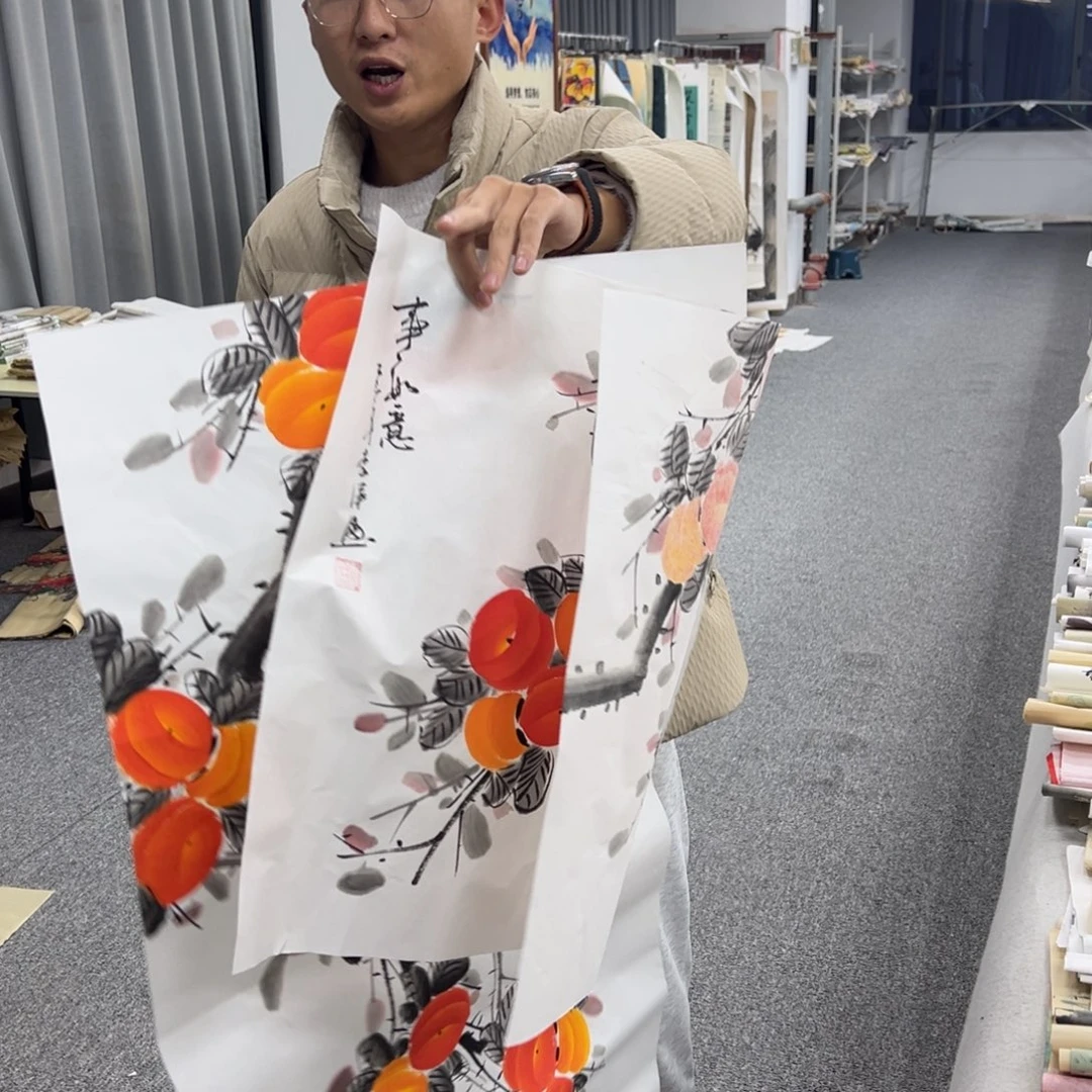 国画卖字画的小男孩