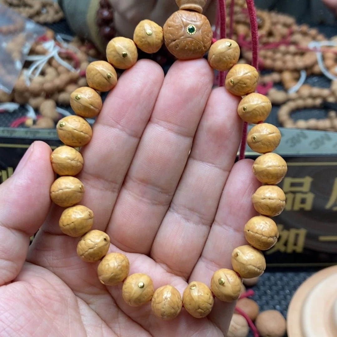 凤眼菩提吊坠11.5黄皮实心金钉手串